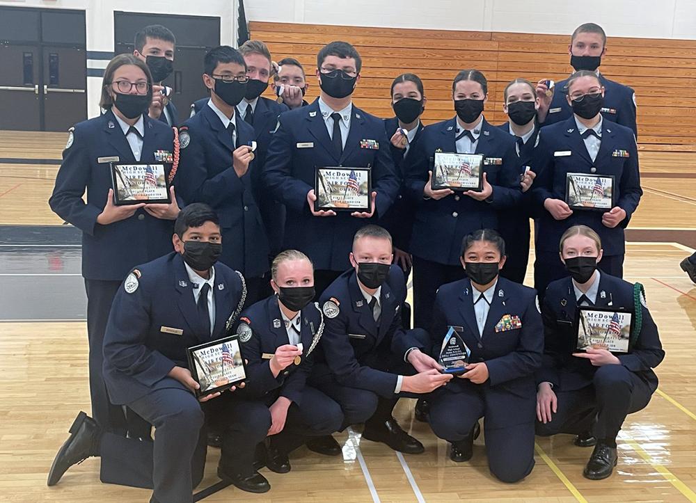 Members of the Pine-Richland/Mars Area U.S. Air Force JROTC Drill Teams pause for a picture with their individual and team awards following the McDowell South JROTC Drill Competition.