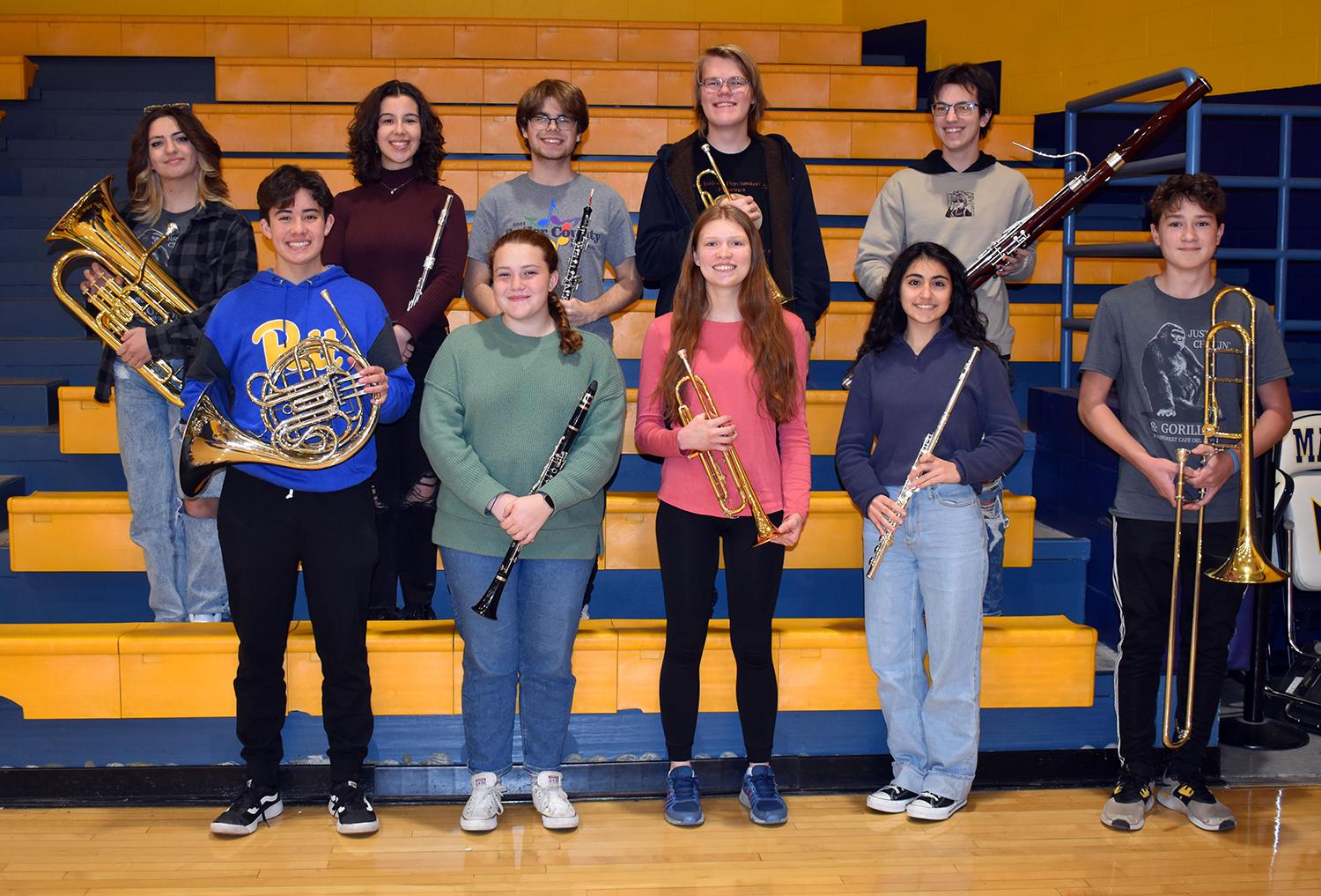 Mars Area High School students (back row, from left) Sydney Denk, Madelyn Ostapchenko, Ian Fuechslin, Alex Vedernikov, Andrew Nelson, (front row) Alex Schumann, Meghan Smith, Jenny Morrison, Adriana Najjar, Carter Snyder and (not pictured) Ethan Musler were selected to join in the PMEA District 5 Honors Band Festival.