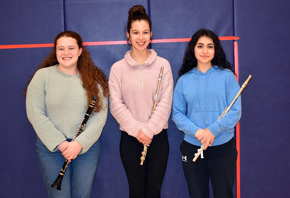 Mars Area High School students Meghan Smith, Madelyn Ostapchenko and Adriana Najjar were selected to perform at the PMEA Region Band Festival.