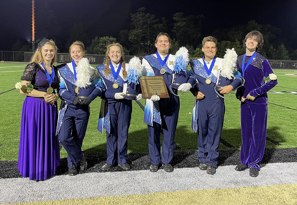 Members of Mars Area High School Marching Band pause for a picture with the band’s first place PIMBA Class 2A award.
